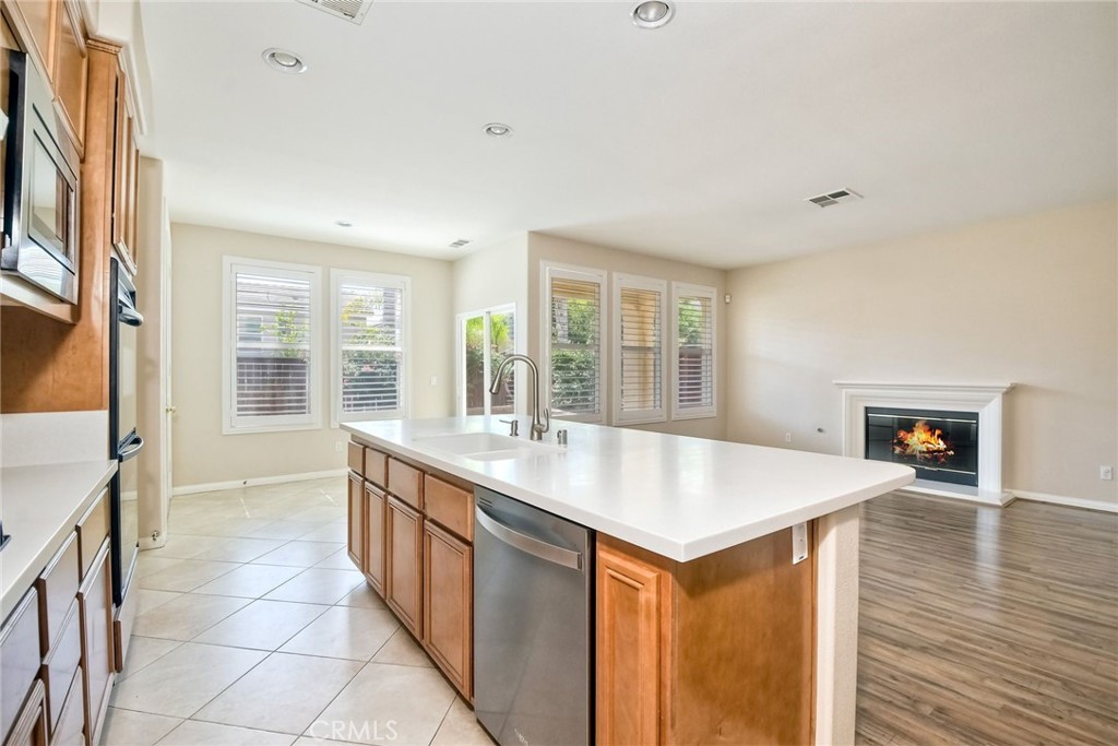 28961 Savannah Drive Temecula, CA 92591 - Photo 16 of 54 Kitchen opens into the family room