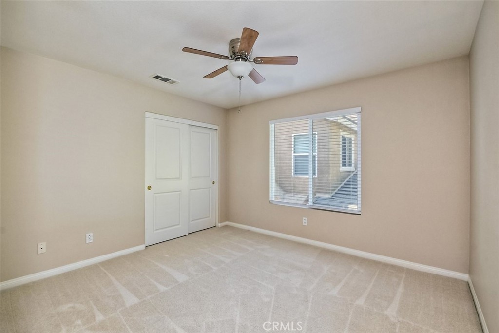 28961 Savannah Drive Temecula, CA 92591 - Photo 33 of 54 a view of an empty room with a window