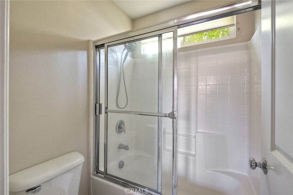 28961 Savannah Drive Temecula, CA 92591 - Photo 35 of 54 a bathroom with a shower and a toilet