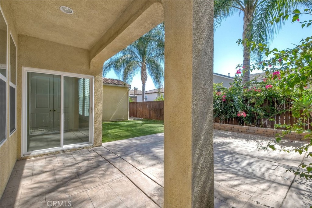 28961 Savannah Drive Temecula, CA 92591 - Photo 40 of 54 a view of a glass door and a yard