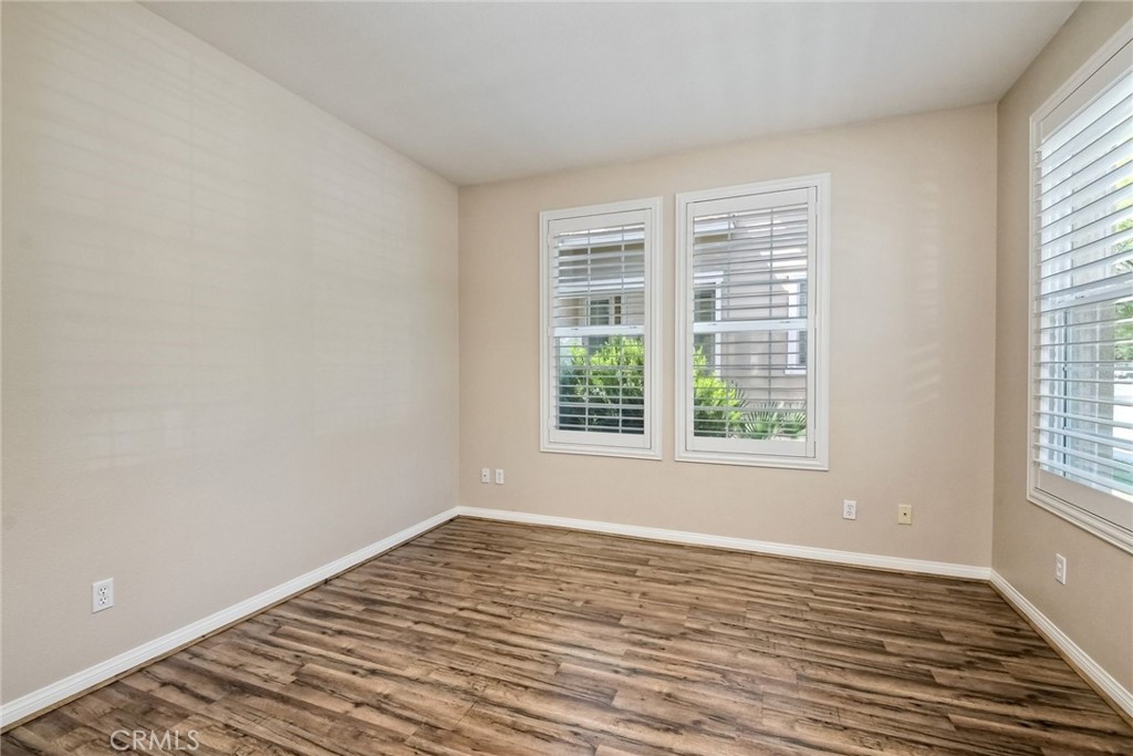 28961 Savannah Drive Temecula, CA 92591 - Photo 8 of 54 a view of empty room with wooden floor and fan