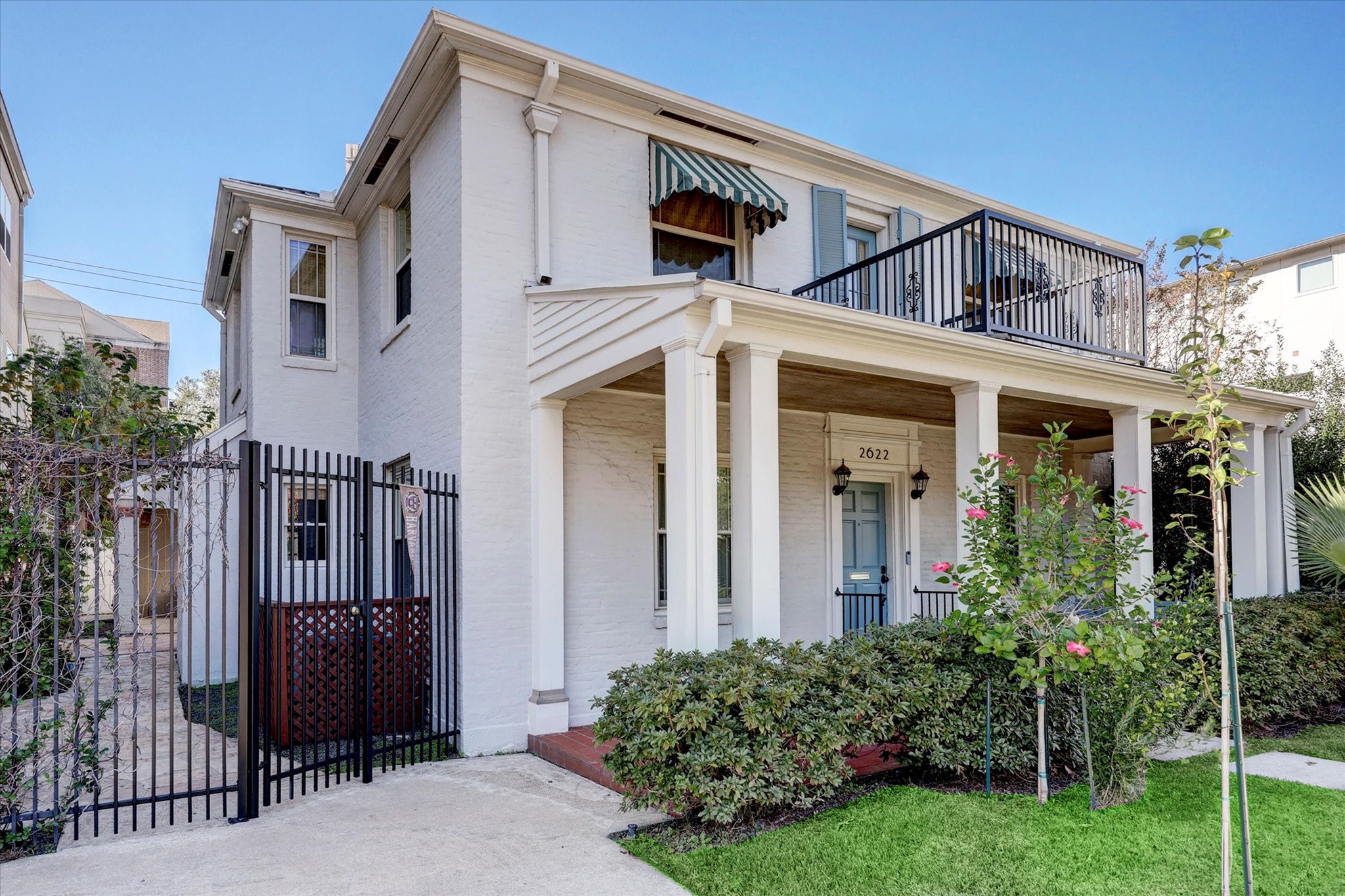 2622 Westgate Drive Houston, TX 77098 - Photo 2 of 20 a view of a house with a small yard and plants