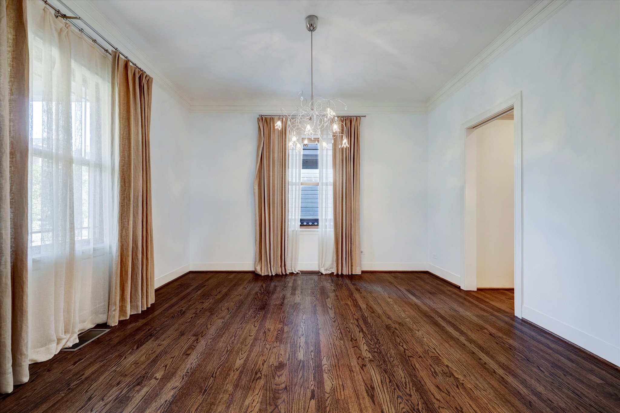 2622 Westgate Drive Houston, TX 77098 - Photo 5 of 20 a view of a room with wooden floor staircase and a living room