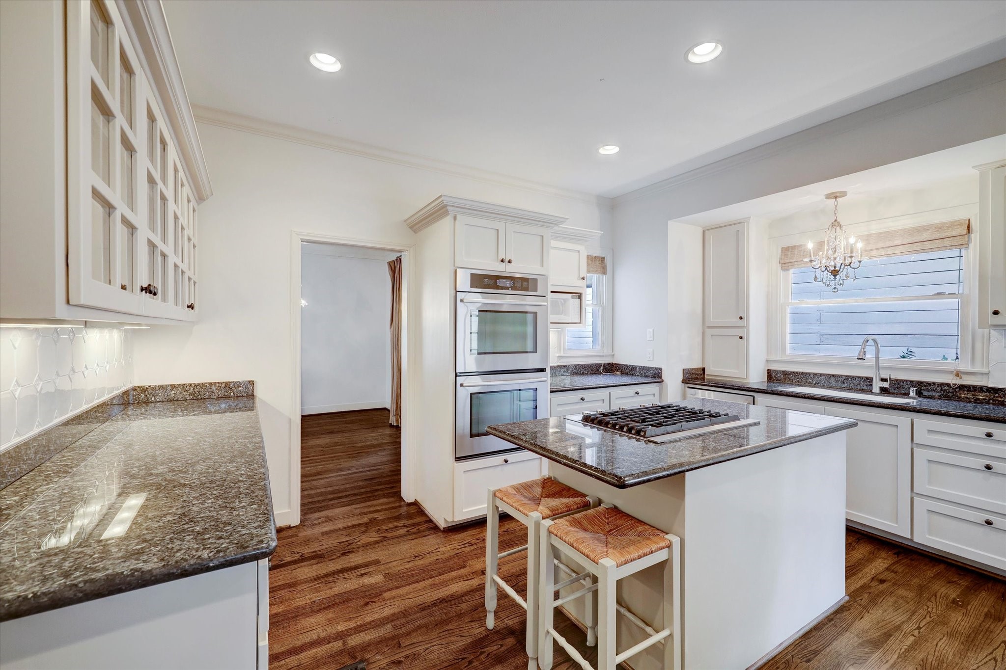 2622 Westgate Drive Houston, TX 77098 - Photo 6 of 20 a kitchen with stainless steel appliances granite countertop a stove and a sink