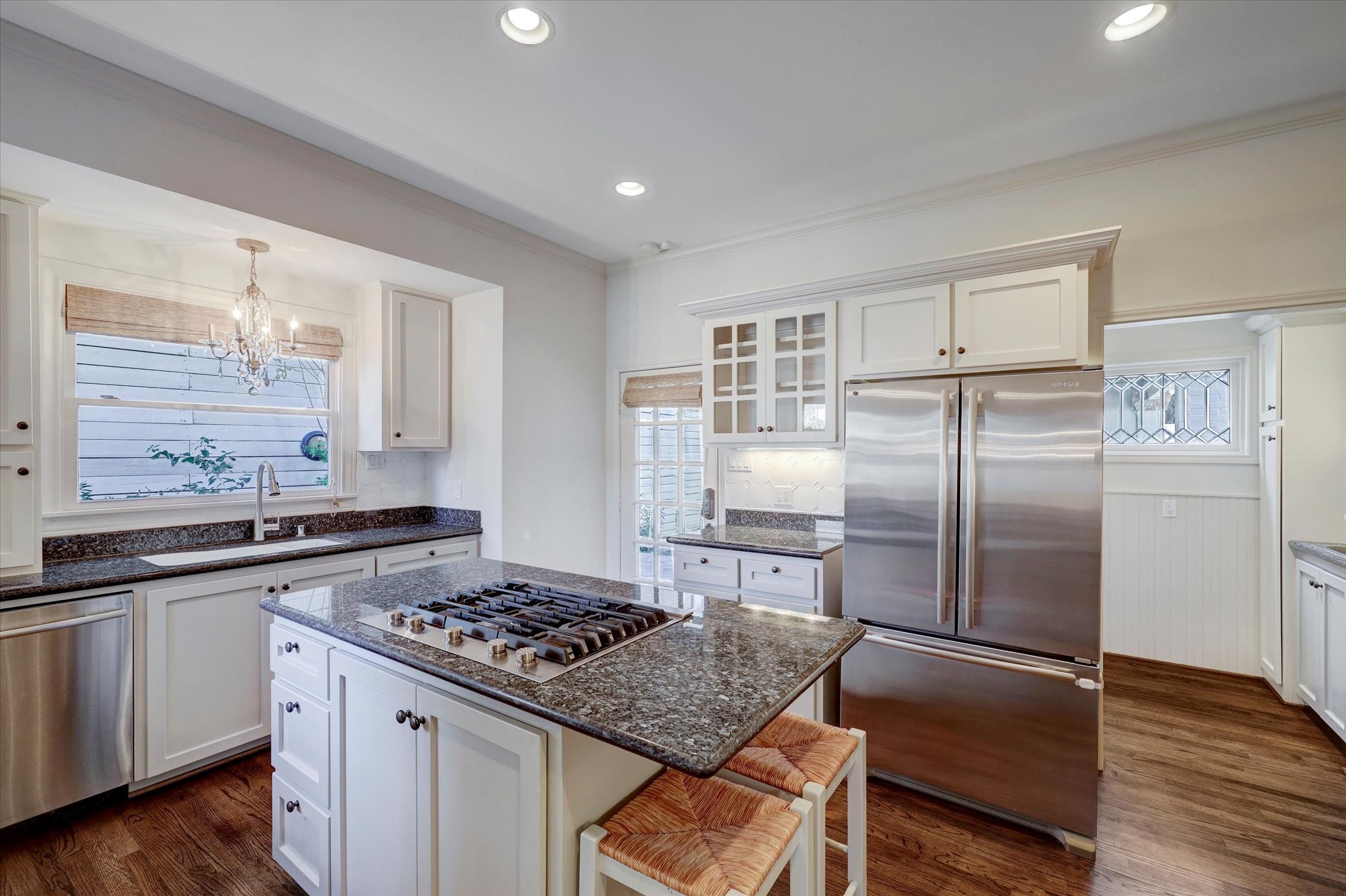 2622 Westgate Drive Houston, TX 77098 - Photo 7 of 20 a kitchen with stainless steel appliances granite countertop a sink stove and refrigerator