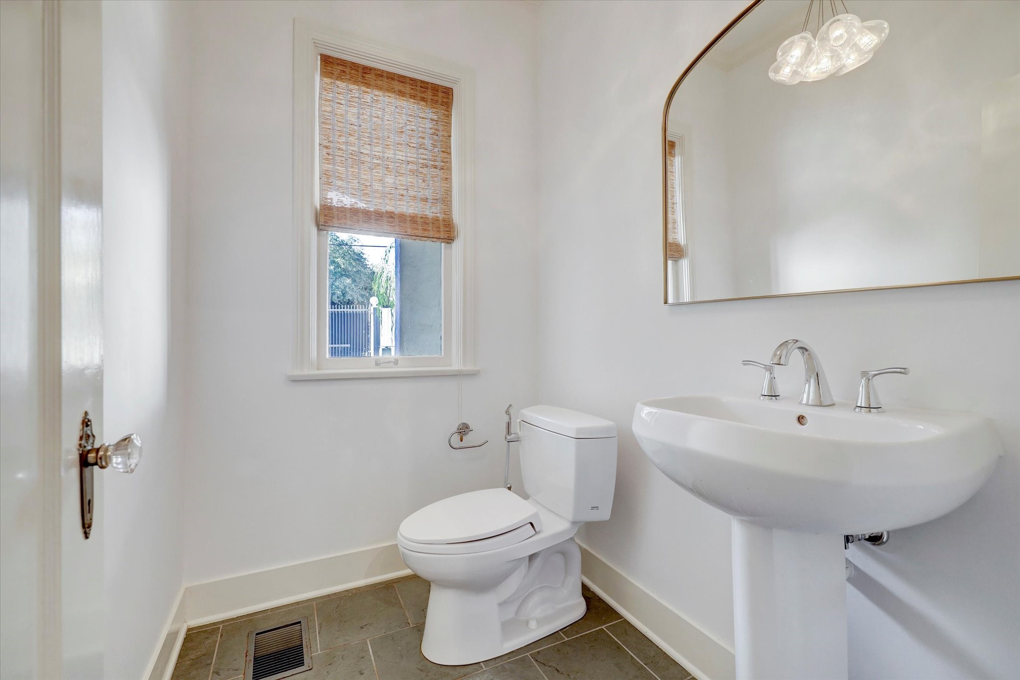 2622 Westgate Drive Houston, TX 77098 - Photo 9 of 20 a bathroom with a sink toilet and a mirror