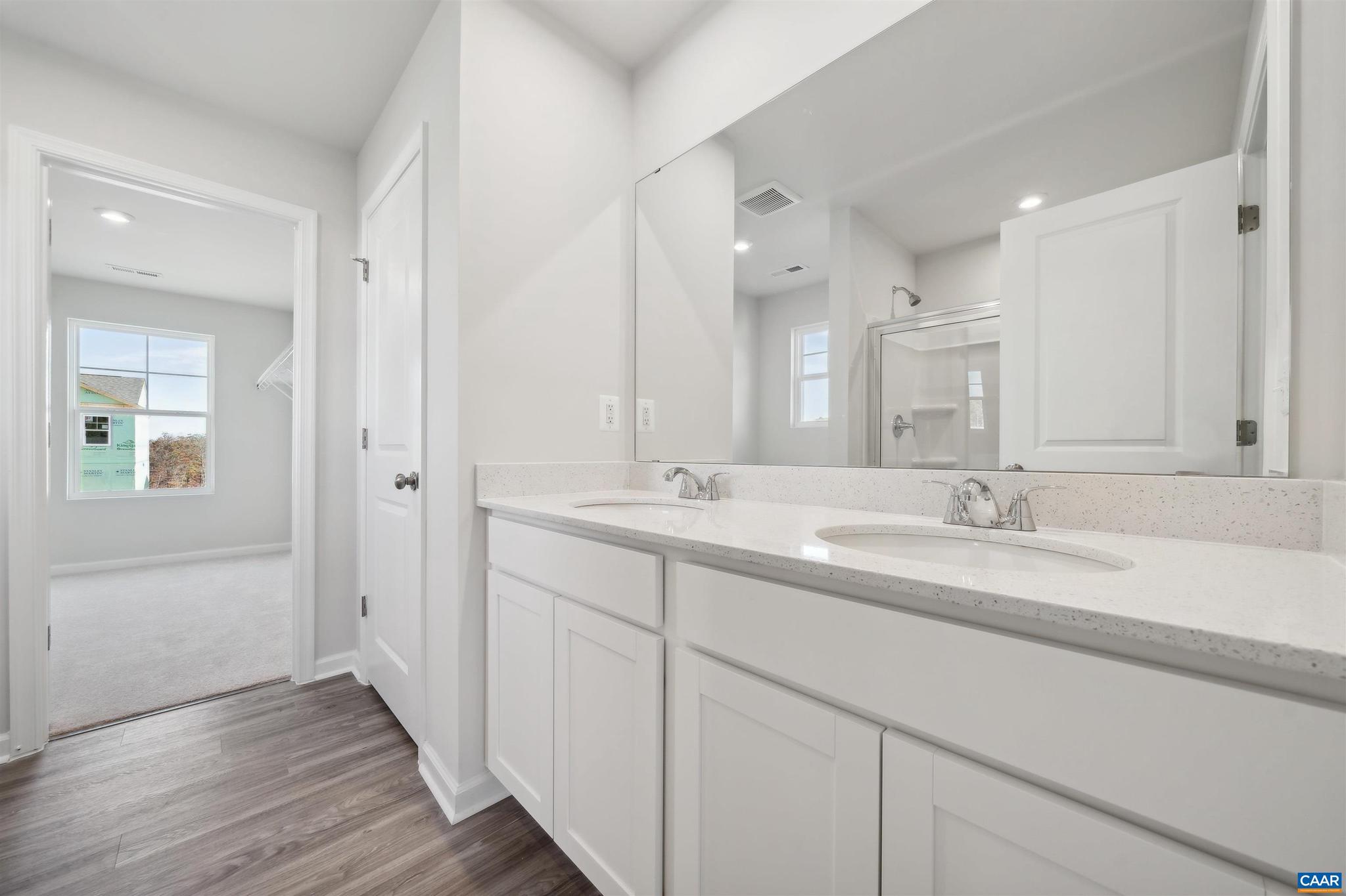363 Trailfork Road Barboursville, VA 22923 - Photo 10 of 14 a bathroom with double sink and a mirror
