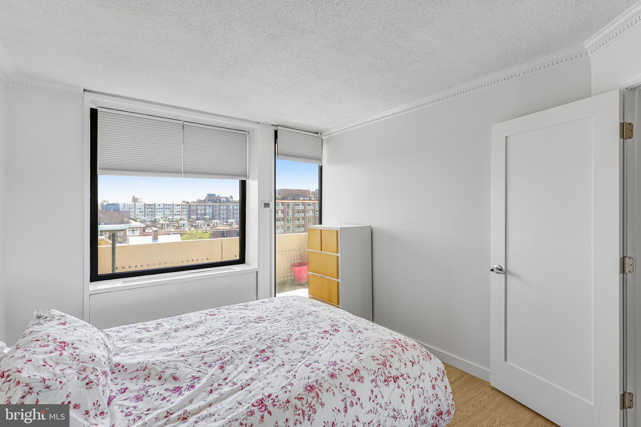 1245 4th Street Southwest, Unit E711 Washington, DC 20024 - Photo 12 of 33 Bedroom with large picture window