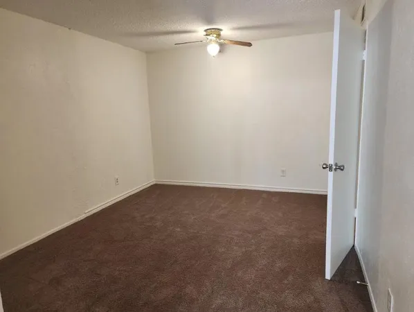 a view of a small space with a fan