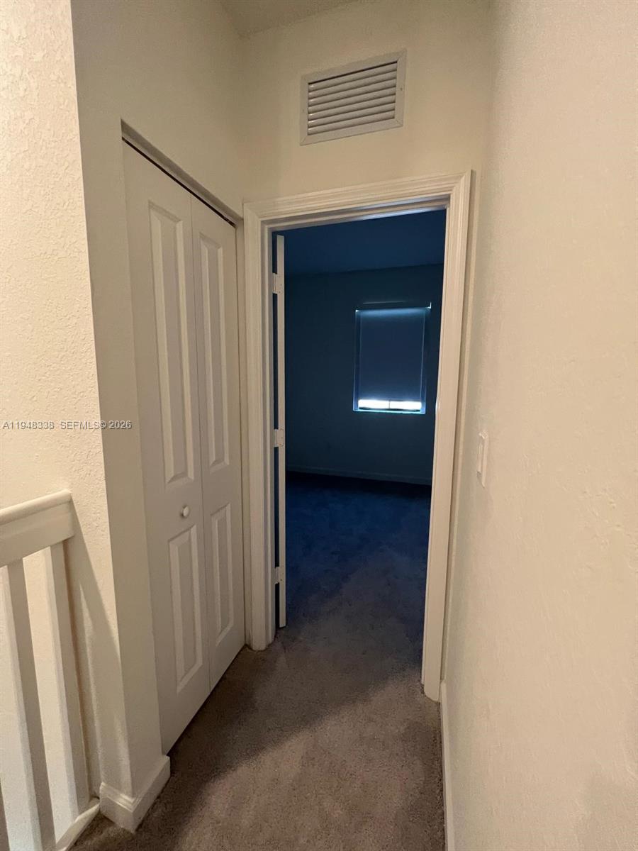 12908 Southwest 233rd Terrace Homestead, FL 33032 - Photo 18 of 23 a view of a closet area