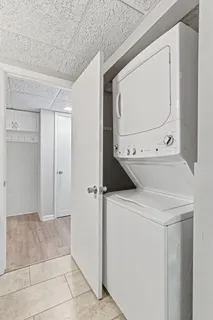 a view of bathroom with a washer and dryer