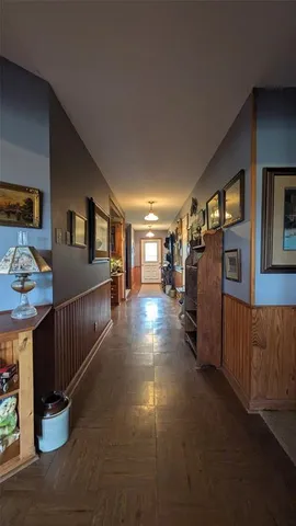 a view of room with window and furniture