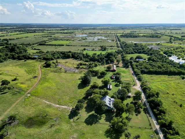 a view of a city with an ocean