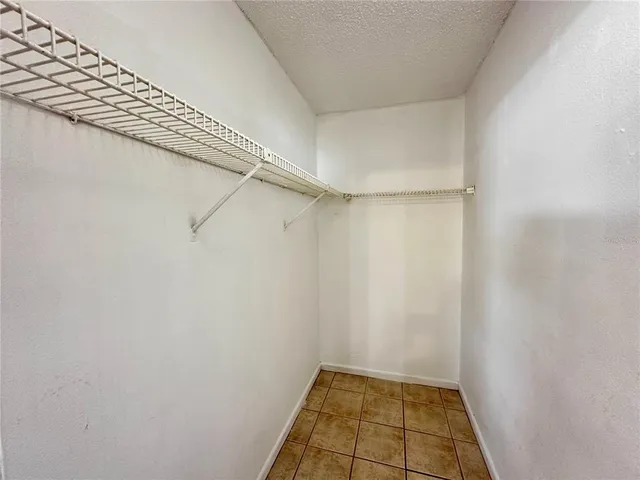 a view of a room with white walls