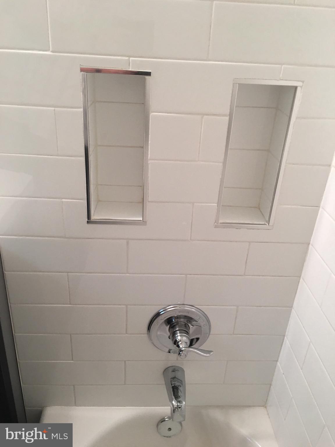 3532 Gunston Road Alexandria, VA 22302 - Photo 21 of 33 Tiled in cubbyholes for shampoo and soap