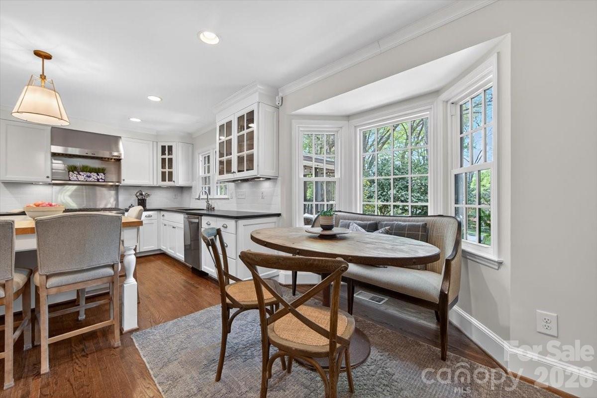 308 Robmont Road Charlotte, NC 28270 - Photo 12 of 43 a view of a dining room with furniture and a window
