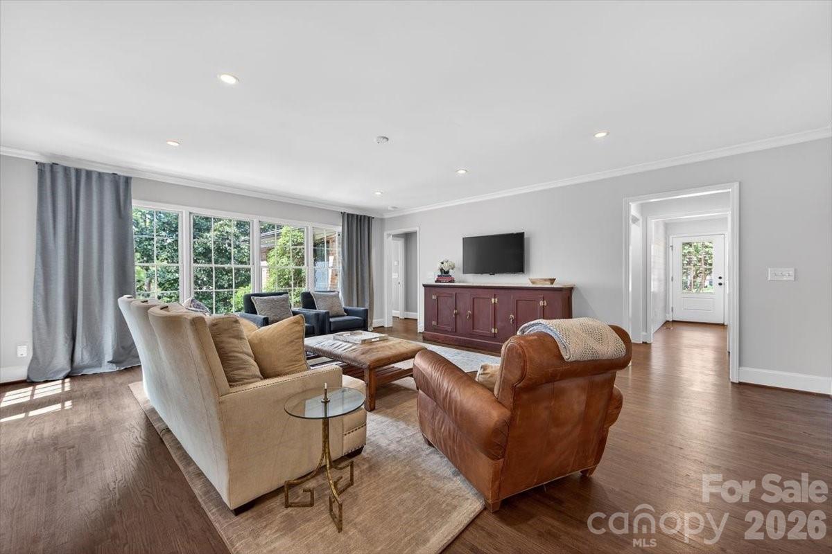 308 Robmont Road Charlotte, NC 28270 - Photo 17 of 43 a living room with furniture and a flat screen tv