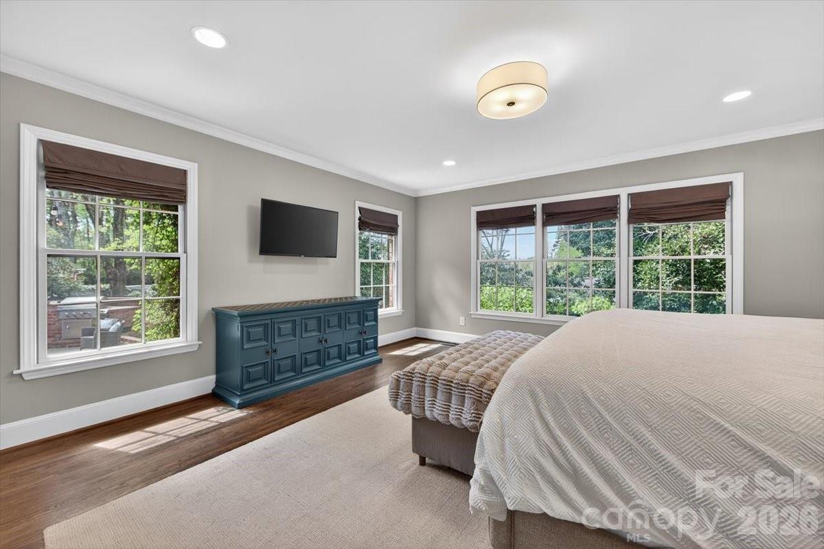 308 Robmont Road Charlotte, NC 28270 - Photo 20 of 43 a bedroom with a bed and a window