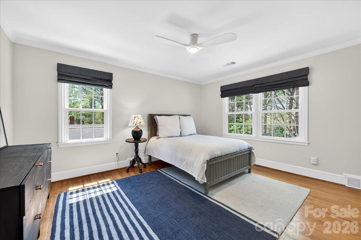 308 Robmont Road Charlotte, NC 28270 - Photo 29 of 43 a bedroom with a bed and a window