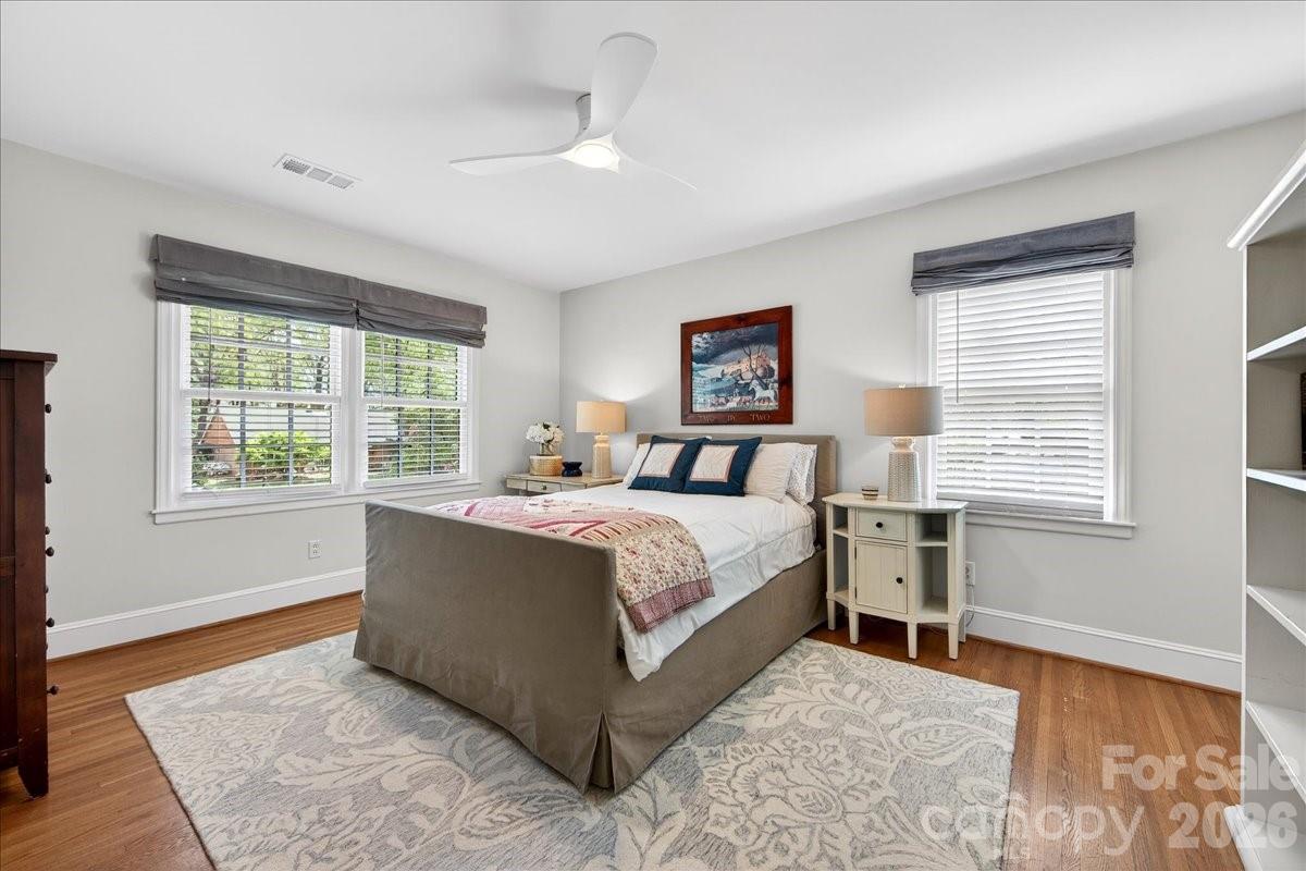 308 Robmont Road Charlotte, NC 28270 - Photo 32 of 43 a spacious bedroom with a large bed and a window