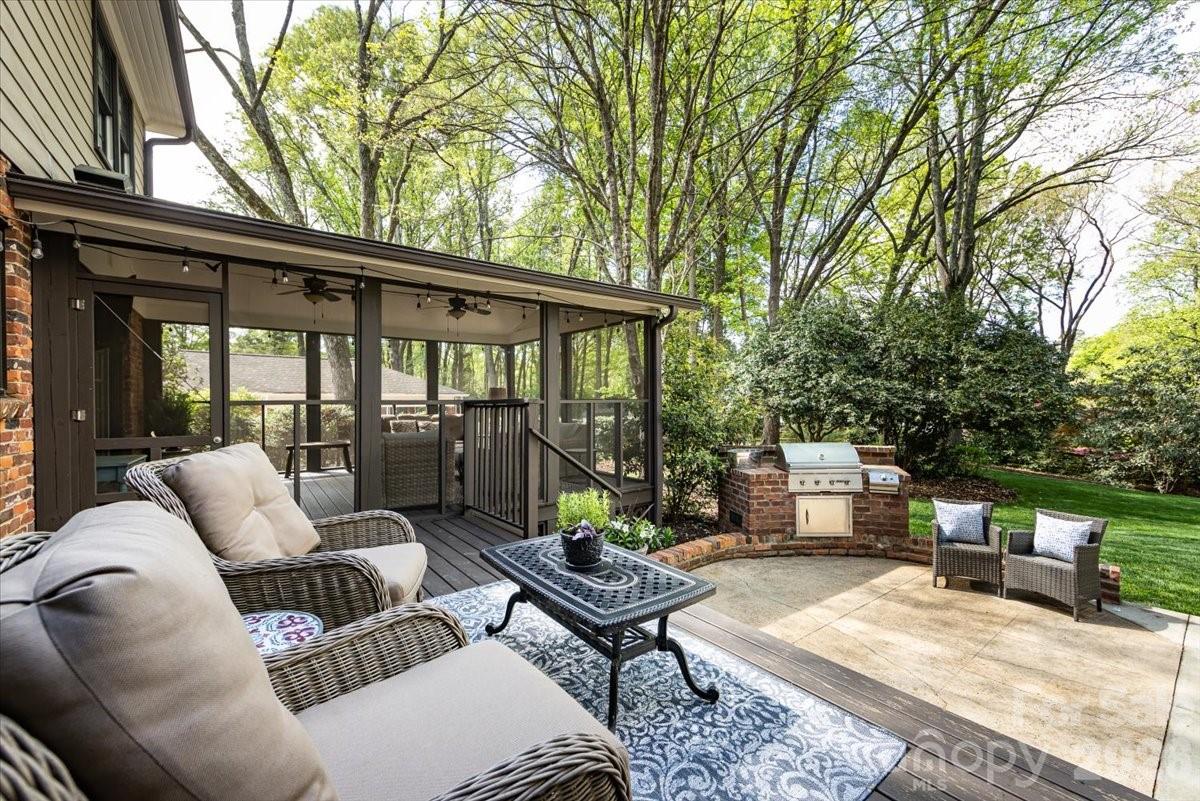 308 Robmont Road Charlotte, NC 28270 - Photo 37 of 43 a balcony with furniture and a potted plant