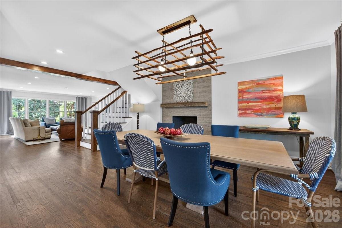 308 Robmont Road Charlotte, NC 28270 - Photo 6 of 43 a dining room with furniture a rug and wooden floor