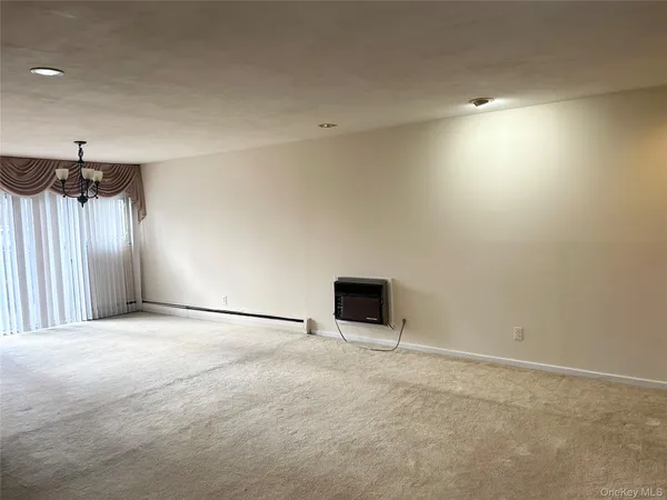 a view of a livingroom with a chandelier