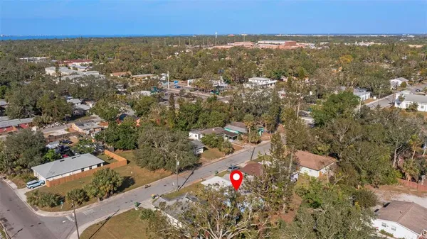 an aerial view of residential houses with city view and city view