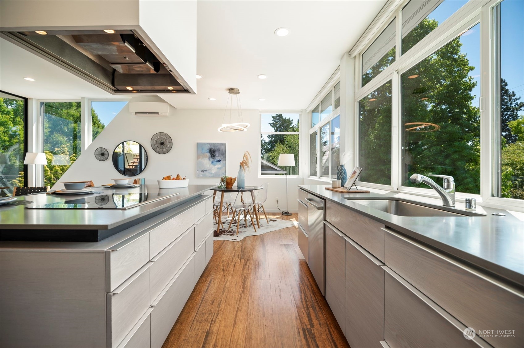 4322 Eastern Avenue North Seattle, WA 98103 - Photo 13 of 39 a kitchen with stainless steel appliances granite countertop a sink and a stove