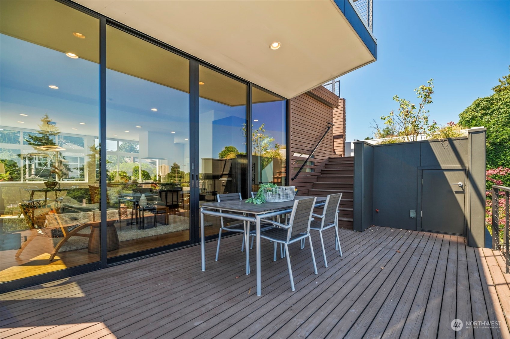 4322 Eastern Avenue North Seattle, WA 98103 - Photo 16 of 39 a dining room with furniture entryway and wooden floor