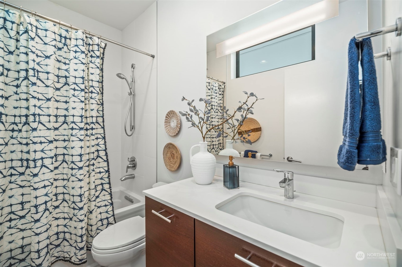 4322 Eastern Avenue North Seattle, WA 98103 - Photo 24 of 39 a bathroom with a sink toilet and shower