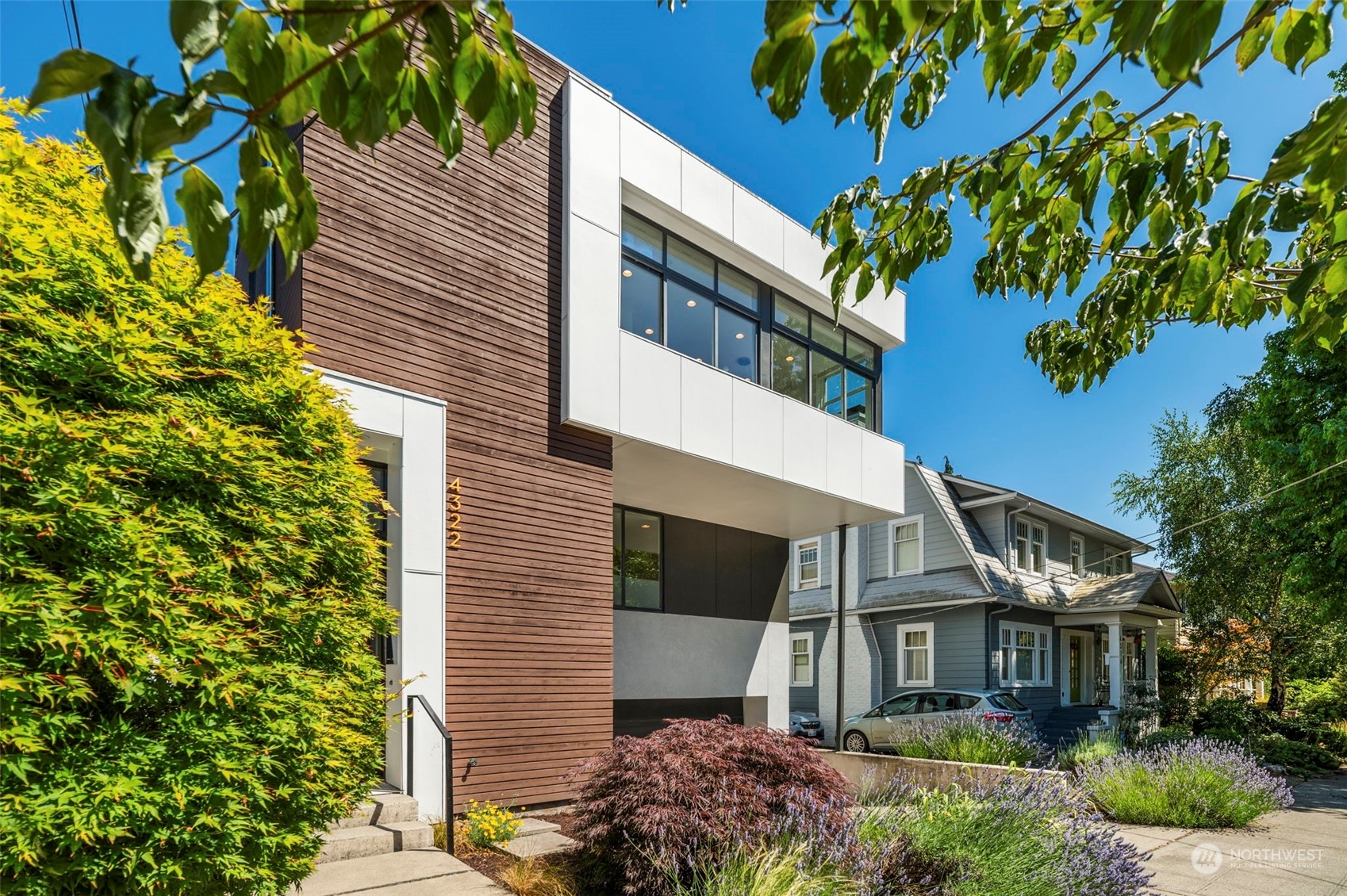 4322 Eastern Avenue North Seattle, WA 98103 - Photo 3 of 39 a front view of a house with a tree