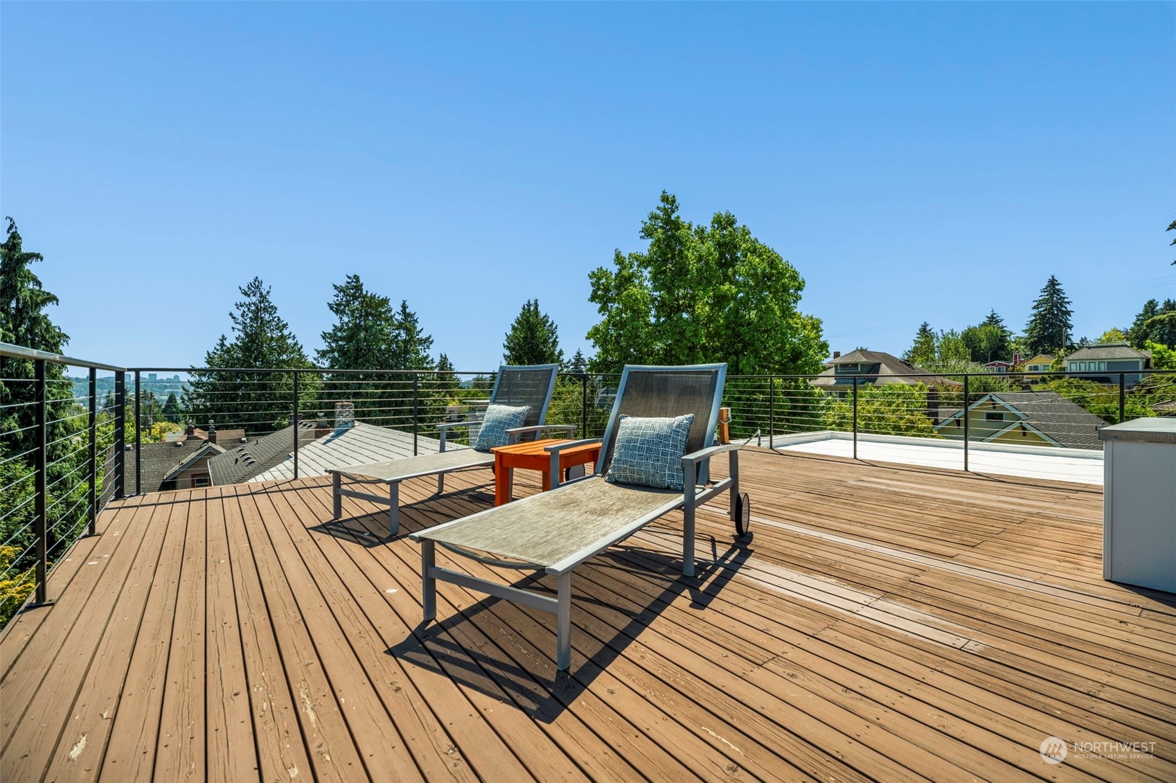 4322 Eastern Avenue North Seattle, WA 98103 - Photo 31 of 39 a view of a terrace with wooden floor and outdoor seating