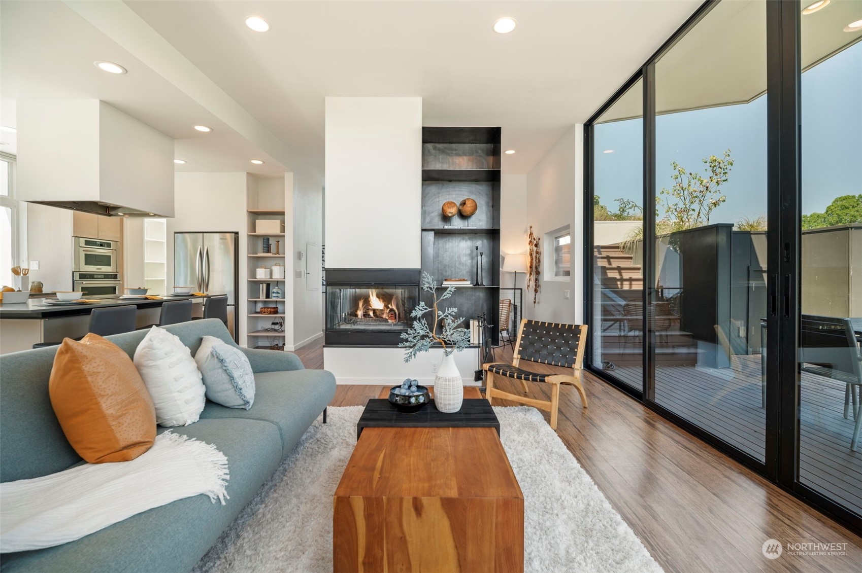 4322 Eastern Avenue North Seattle, WA 98103 - Photo 10 of 39 a living room with furniture and a glass door