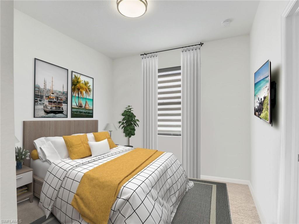 4212 Raffia Palm Circle Naples, FL 34119 - Photo 24 of 49 a bedroom with a large bed and a window