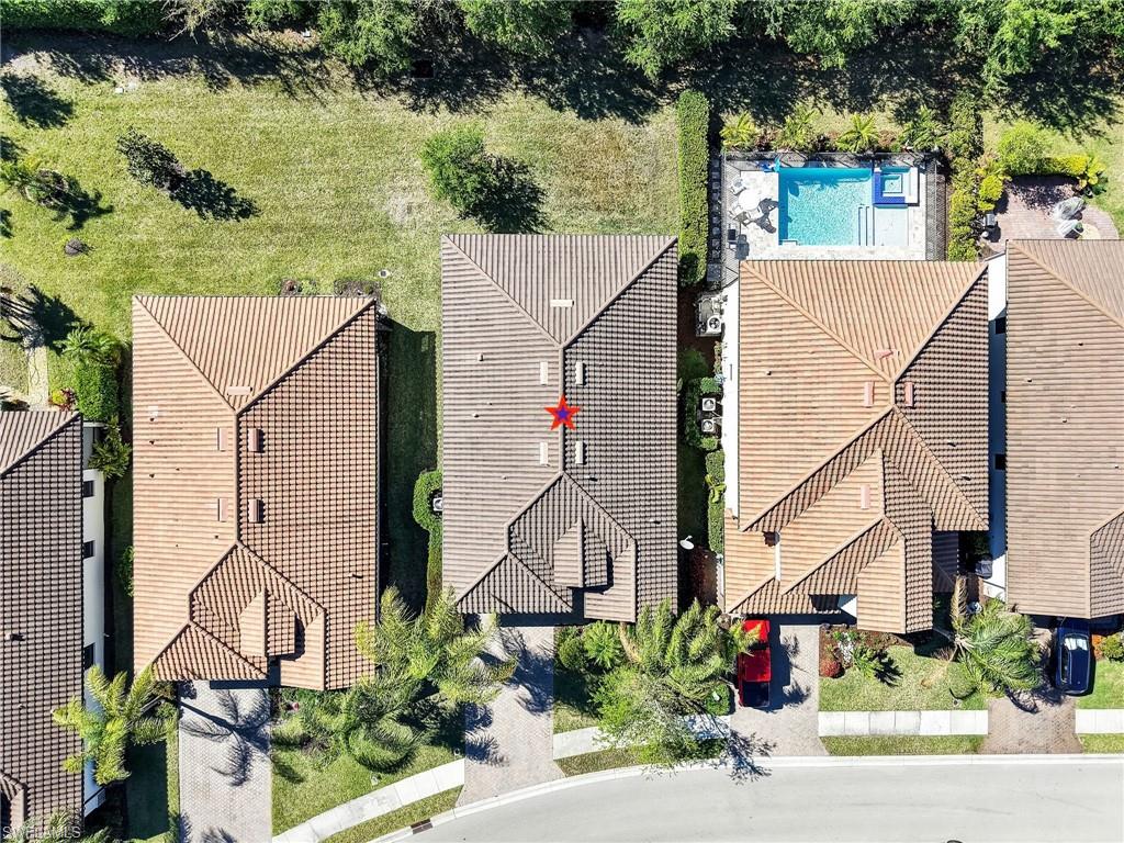 4212 Raffia Palm Circle Naples, FL 34119 - Photo 3 of 49 an aerial view of a house