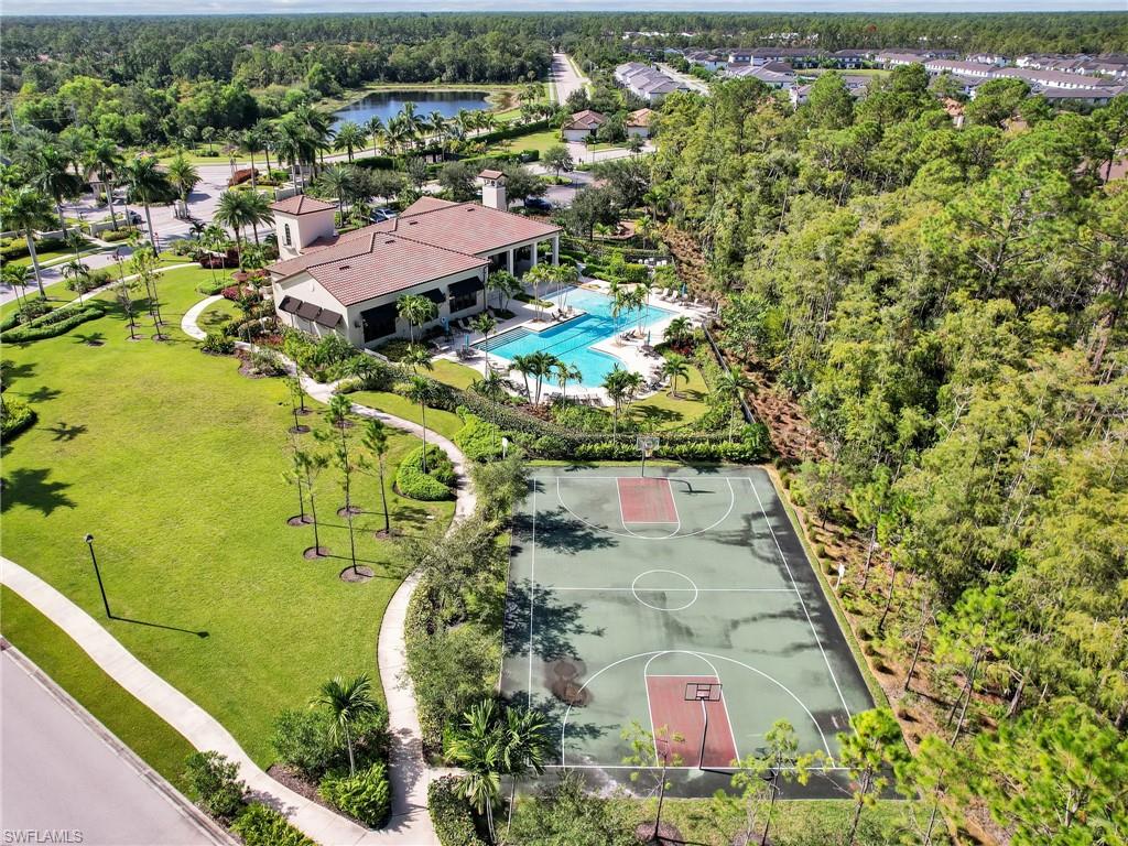 4212 Raffia Palm Circle Naples, FL 34119 - Photo 35 of 49 an aerial view of residential houses with outdoor space
