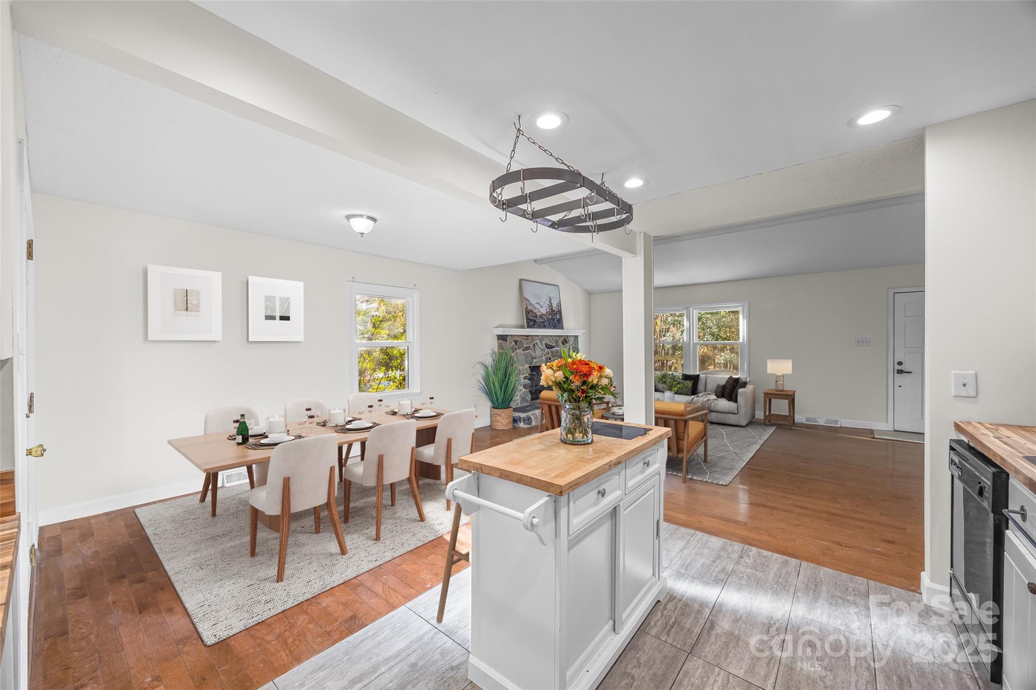 2137 Manawa Lane Tega Cay, SC 29708 - Photo 18 of 48 a living room with furniture a clock and a window