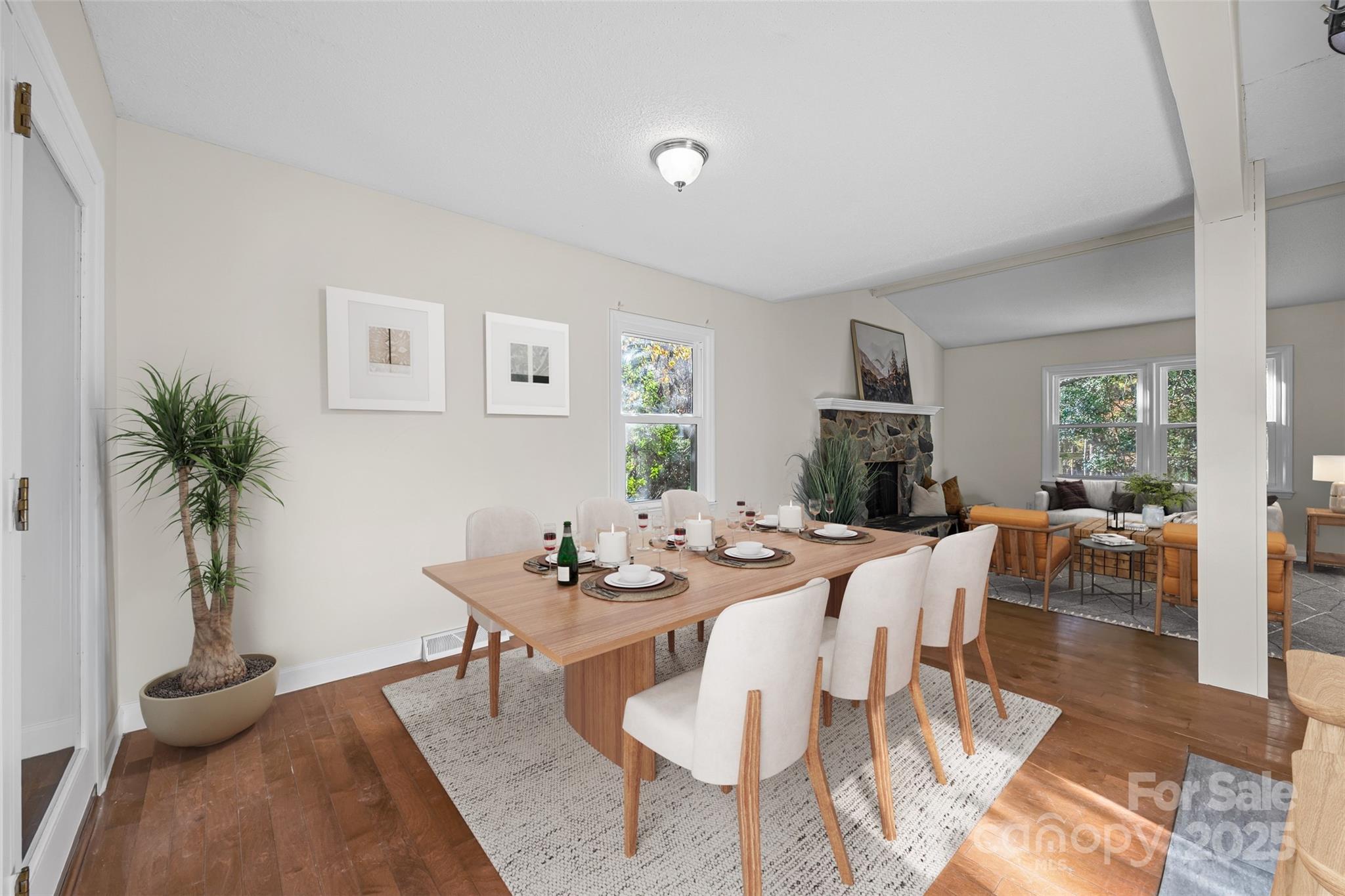 2137 Manawa Lane Tega Cay, SC 29708 - Photo 21 of 48 a view of a dining room with furniture window and wooden floor
