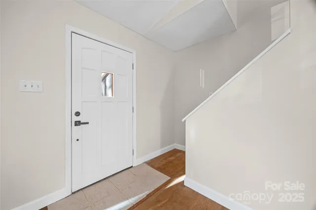 a view of a hallway with closet