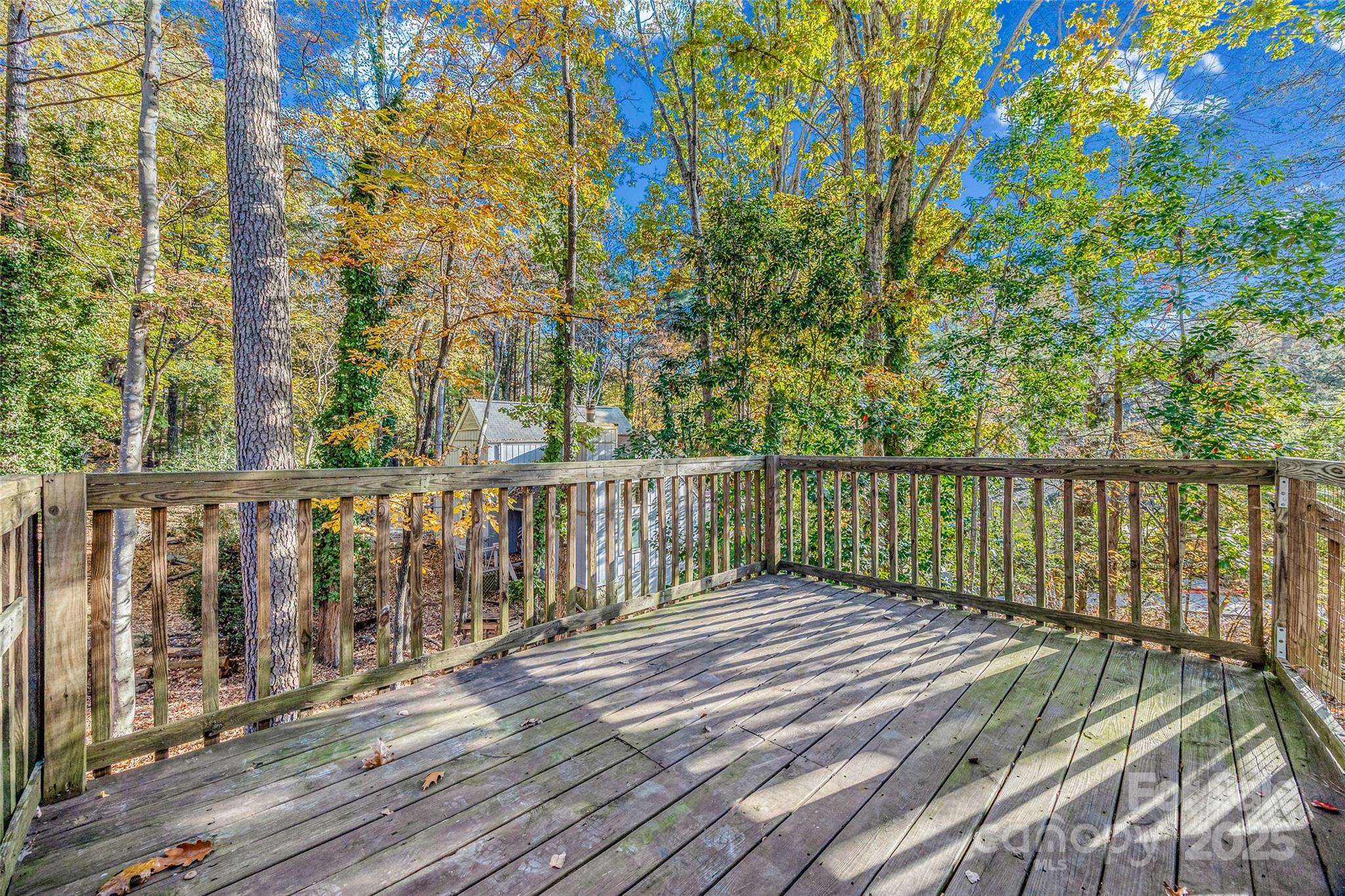 2137 Manawa Lane Tega Cay, SC 29708 - Photo 5 of 48 a balcony with wooden floor and fence