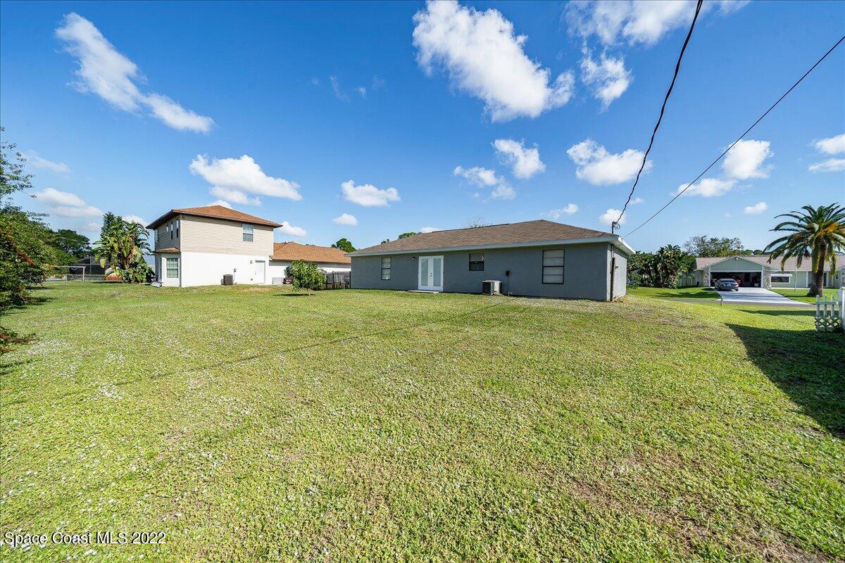 142 Krefeld Road Northwest Palm Bay, FL 32907 - Photo 20 of 21 Back yard