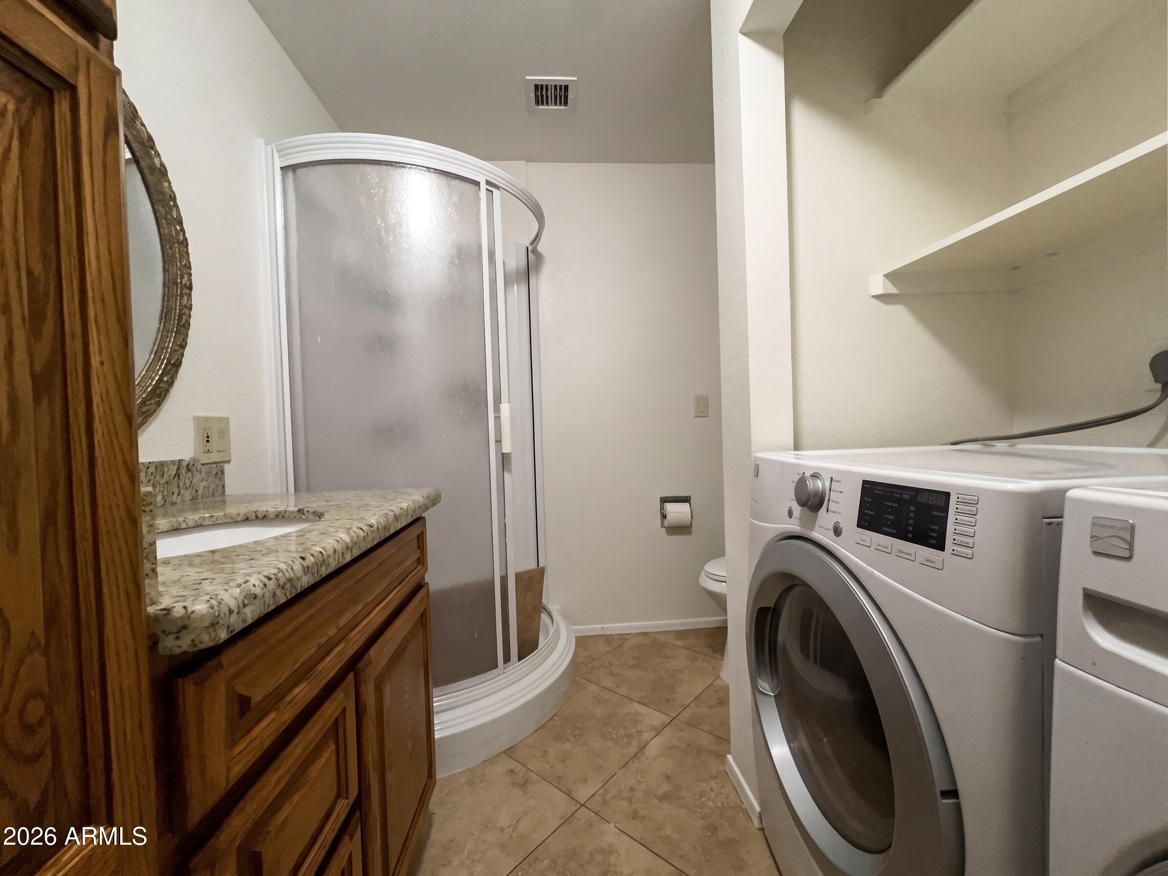 170 East Guadalupe Road, Unit 142 Gilbert, AZ 85234 - Photo 12 of 32 12 - Downstairs Bathroom & Laundry