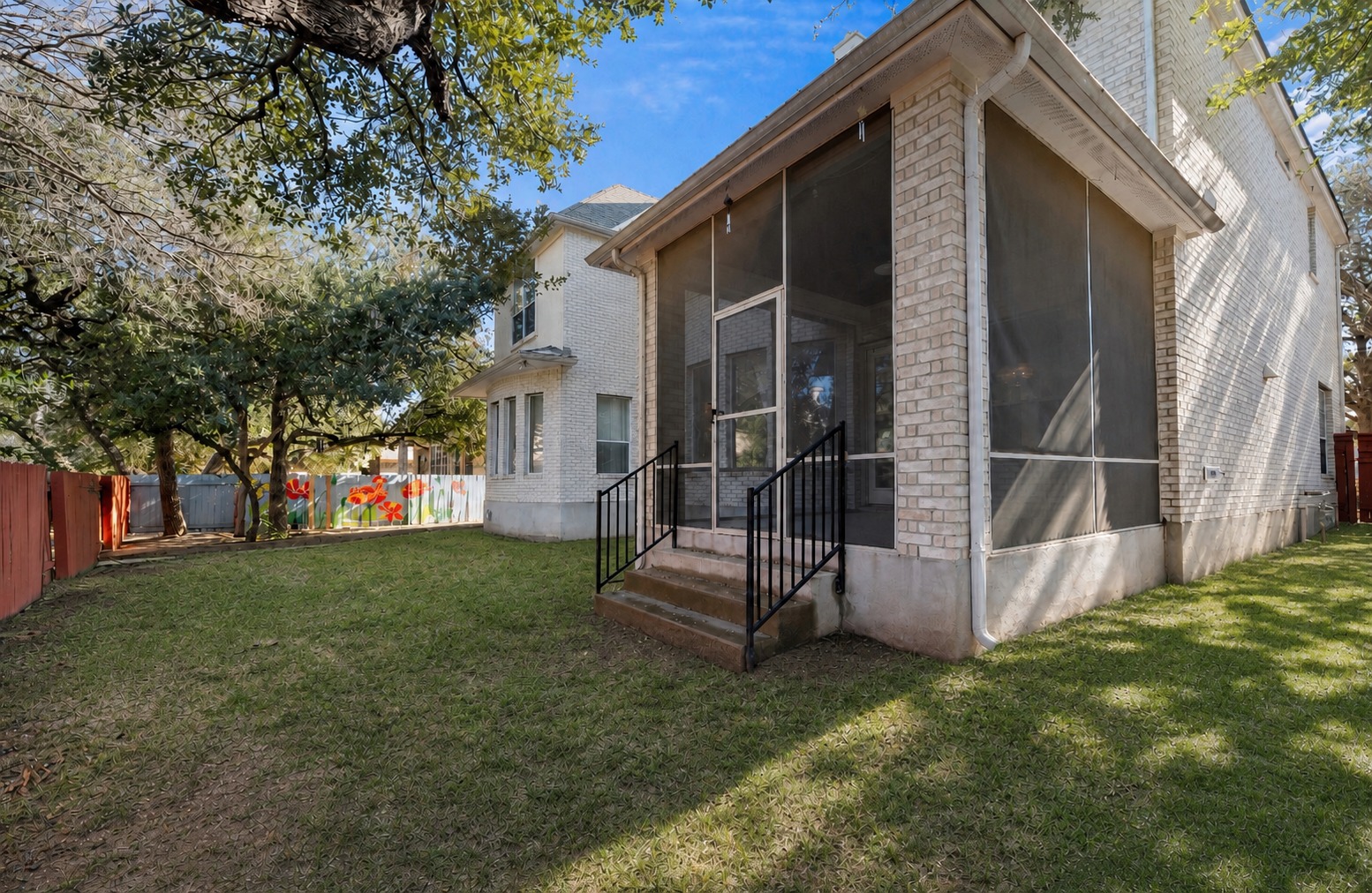 3903 Remington Road Cedar Park, TX 78613 - Photo 28 of 29 A well-maintained yard provides ample space for recreation and relaxation, complemented by a screened-in porch for outdoor enjoyment.