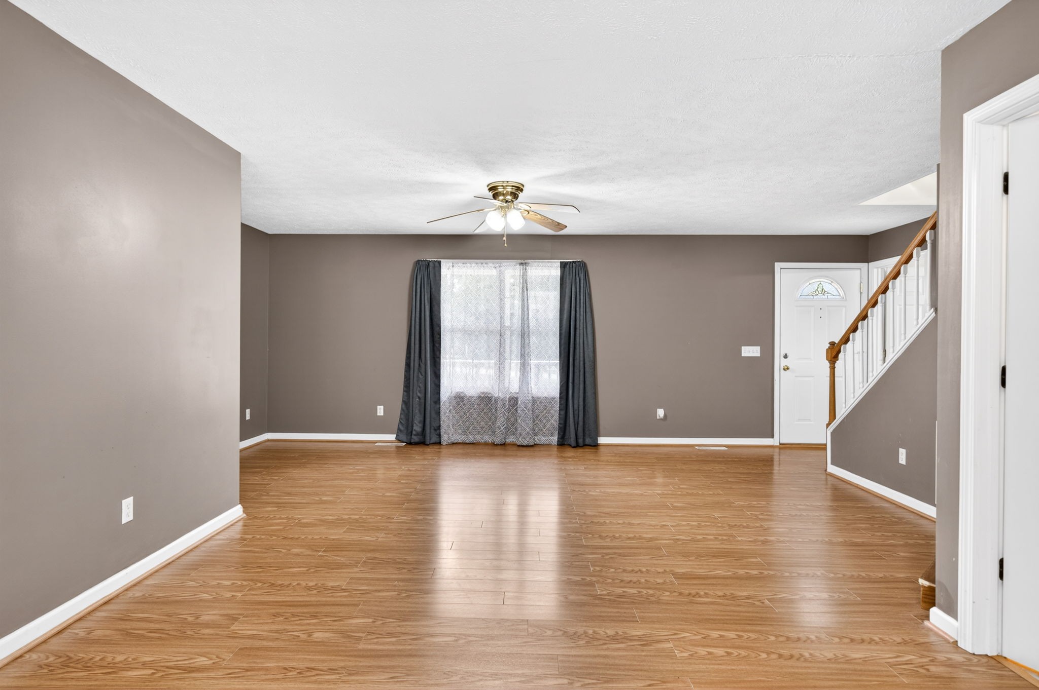 291 Poplar Point Lane Rickman, TN 38580 - Photo 10 of 41 a view of an empty room with window and wooden floor