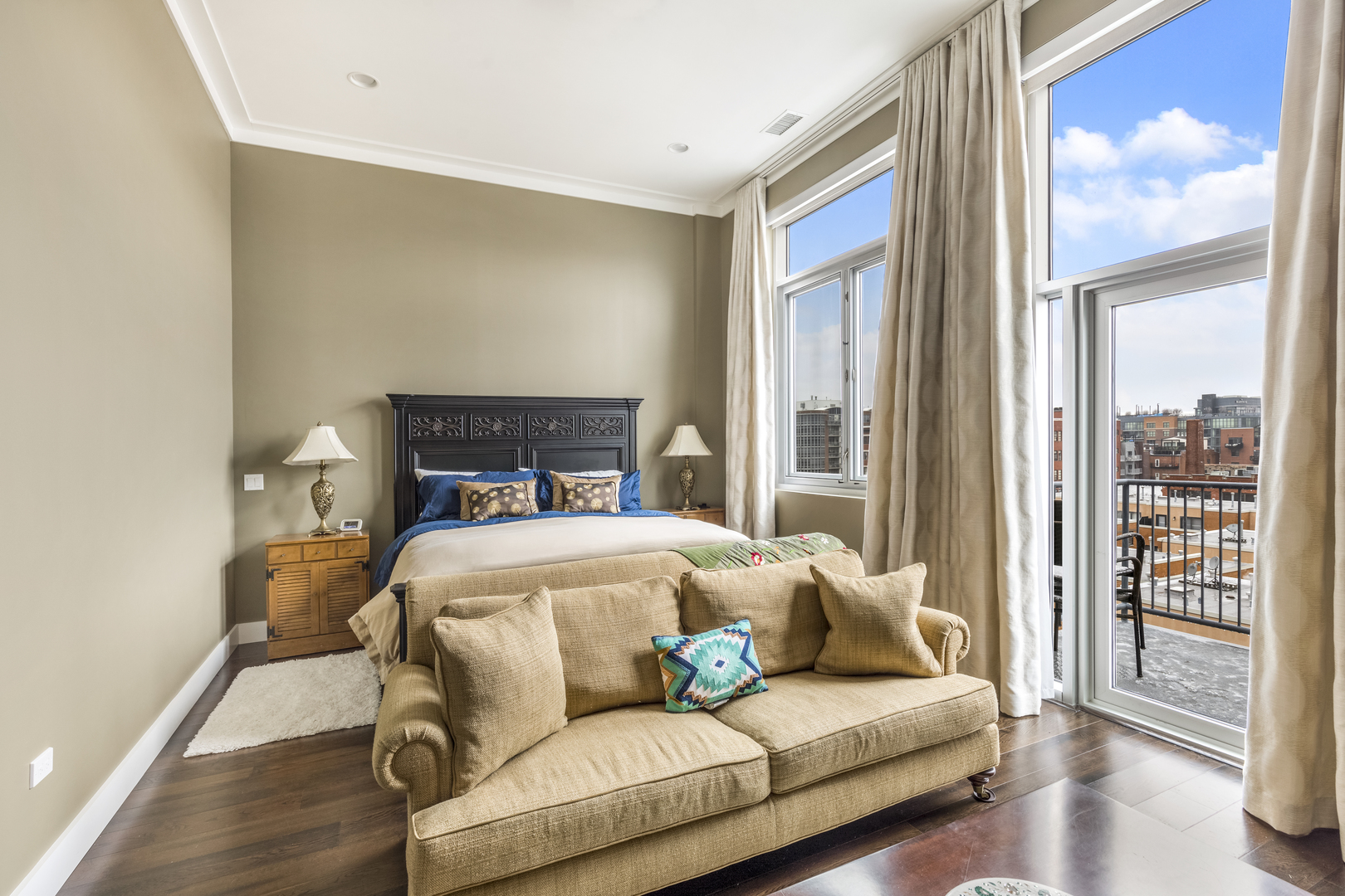 1120 West Adams Street, Unit PHW Chicago, IL 60607 - Photo 11 of 23 a bedroom with a bed and wooden floor