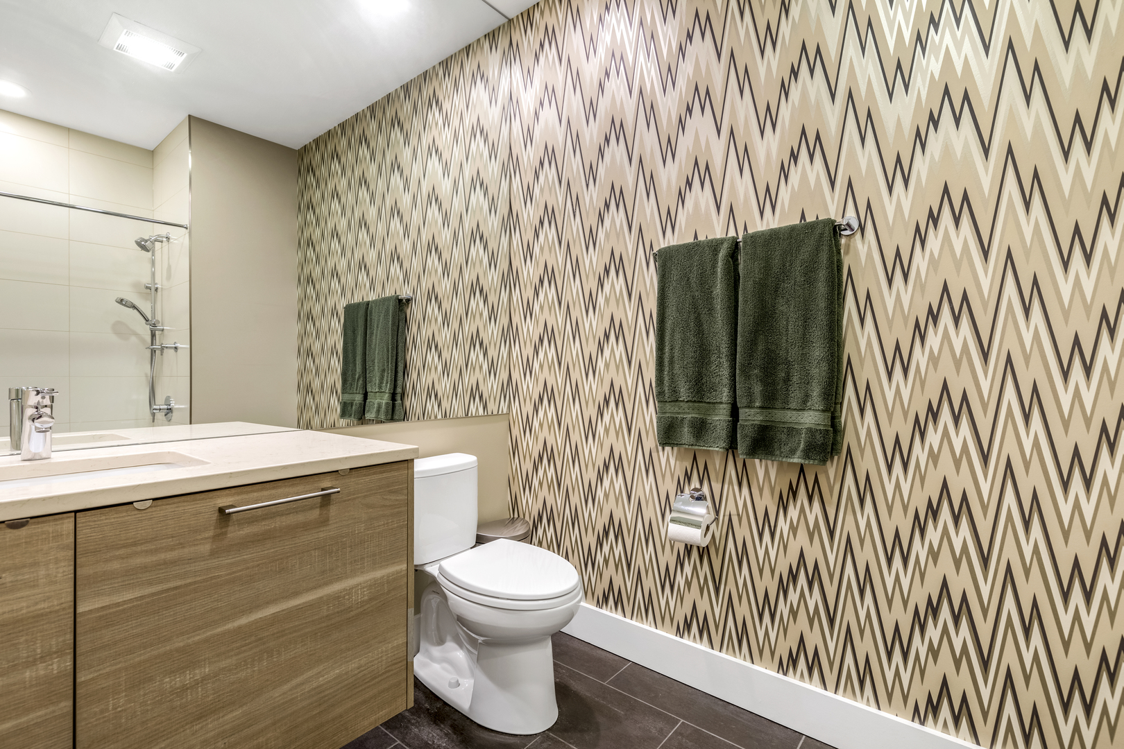 1120 West Adams Street, Unit PHW Chicago, IL 60607 - Photo 17 of 23 a bathroom with a toilet a sink and garden view