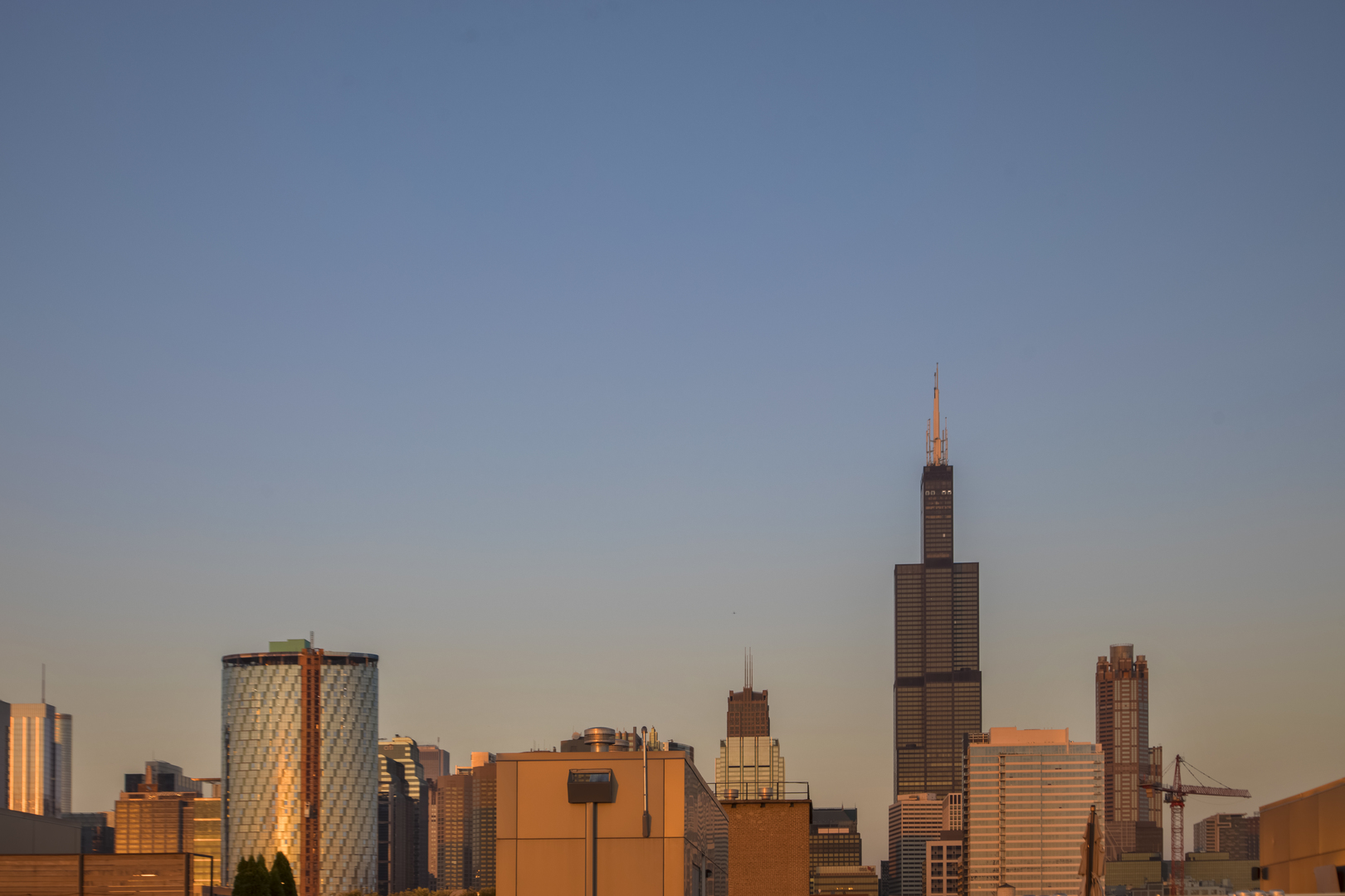1120 West Adams Street, Unit PHW Chicago, IL 60607 - Photo 23 of 23 a close up of a lamp on a table and chairs