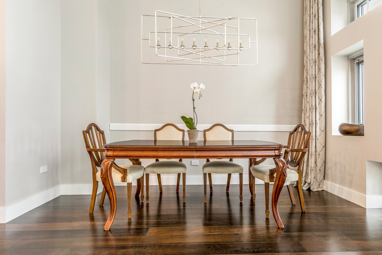 1120 West Adams Street, Unit PHW Chicago, IL 60607 - Photo 8 of 23 a view of a dining room with furniture and wooden floor