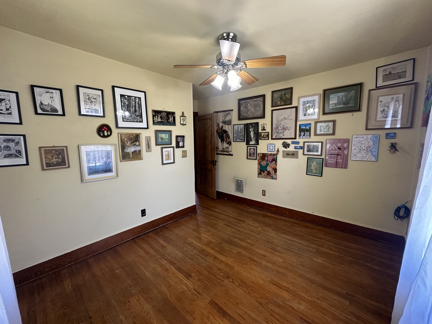 308 South Genesee Street Morrison, IL 61270 - Photo 18 of 24 a view of a house with workspace and wooden floor